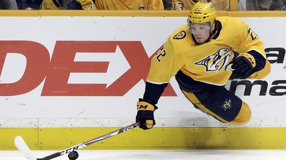 Nashville Predators left wing Kevin Fiala, of Switzerland, falls after being tripped in the second period of an NHL hockey game against the San Jose Sharks, Thursday, March 29, 2018, in Nashville, Ten ...