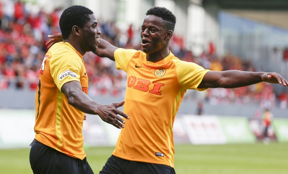 Young Boys&#039; Roger Assale, left, celebrates his goal with Jordan Lotomba during a friendly soccer match of the international Uhrencup tournament between Switzerland&#039;s BSC Young Boys and Portu ...
