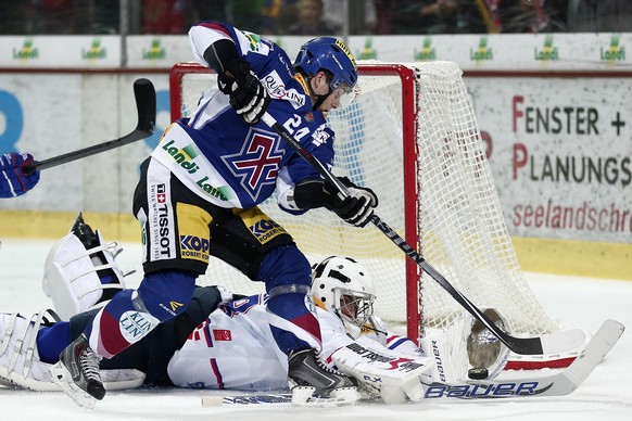 Martin Gerber hielt, was zu halten war: Hier wehrt er einen Puck von Biels Eliot Berthon ab.