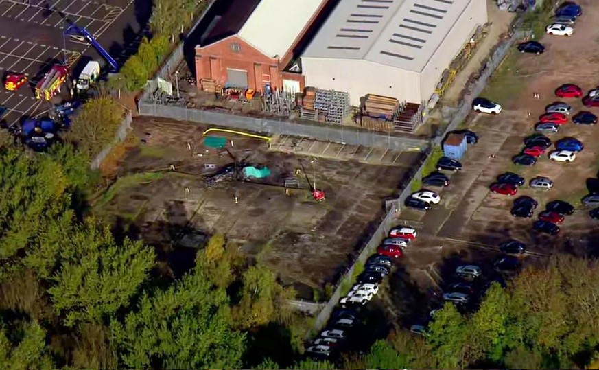In this image made from video provided by Sky News, the site of a helicopter crash is seen near a carpark by the King Power stadium in Leicester, England, Sunday, Oct. 28, 2018. A helicopter belonging ...