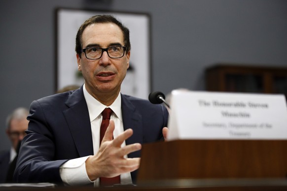 File-This April 9, 2019, file photo shows Treasury Secretary Steven Mnuchin testifying before a House Appropriations subcommittee during a hearing on President Trump&#039;s budget request for Fiscal Y ...