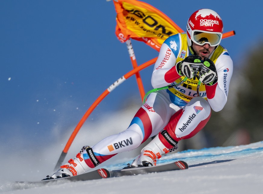 Carlo Janka, of Switzerland, races down the course during a training run for the men&#039;s World Cup downhill ski race in Lake Louise, Alberta, Canada, on Friday, Nov. 29, 2019. (Frank Gunn/The Canad ...