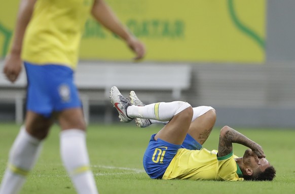 Brazil&#039;s Neymar lies on the pitch after being fouled during a friendly match against Qatar in Brasilia, Brazil, Wednesday, June 5, 2019. Brazil and Qatar are preparing for the Copa America which  ...