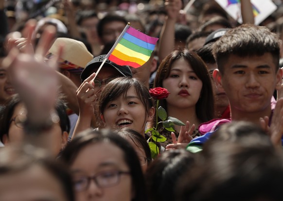 epa07577540 Supporters of same-sex marriage react as they gather outside the parliament building as a bill for marriage equality is debated by parliamentarians in Taipei, Taiwan, 17 May 2019. Accordin ...