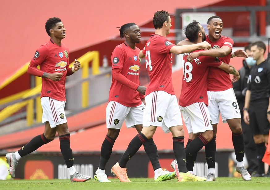 epa08526736 Anthony Martial (R) of Manchester United celebrates with teammates after scoring his team&#039;s third goal during the English Premier League match between Manchester United and AFC Bourne ...