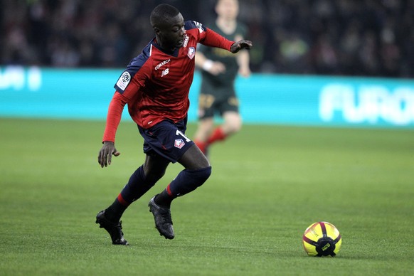 Lille&#039;s Nicolas Pepe controls the ball during the French League One soccer match between Lille and Monaco at the Lille Metropole stadium, in Villeneuve d&#039;Ascq, northern France, Friday, March ...