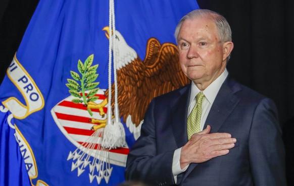 epa06013369 US Attorney General Jeff Sessions participates in the US national anthem before speaking at the National Law Enforcement Training on Child Exploitation meeting in Atlanta, Georgia, USA, 06 ...