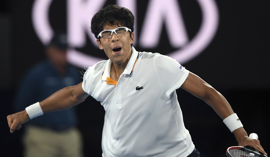South Korea&#039;s Chung Hyeon reacts after winning a point against Serbia&#039;s Novak Djokovic during their fourth round match at the Australian Open tennis championships in Melbourne, Australia, Mo ...
