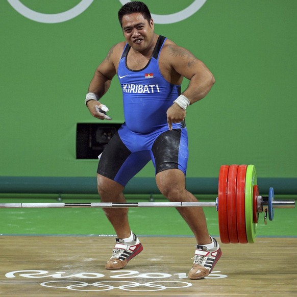 2016 Rio Olympics Weightlifting - Final - Men&#039;s 105kg - Riocentro - Pavilion 2 - Rio de Janeiro, Brazil - 15/08/2016. David Katoatau (KIR) of Kiribati dances as he celebrates a successful lift. R ...