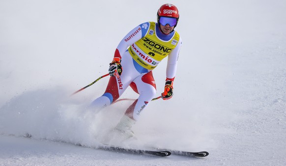 Switzerland&#039;s Beat Feuz arrives at the finish area of an alpine ski, men&#039;s World Cup downhill, in Bormio, northern Italy, Wednesday, Dec. 30, 2020. (AP Photo/Alessandro Trovati)