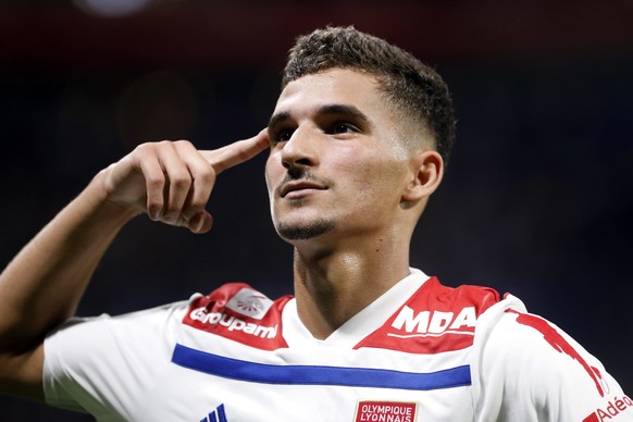 Lyon&#039;s Houssem Aouar celebrates after he scored a goal against Marseille during their French League One soccer match in Decines, near Lyon, central France, Sunday, Sept. 23, 2018. (AP Photo/Laure ...