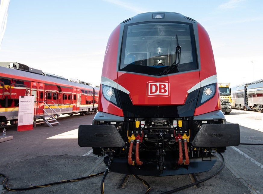 epa07027705 The Deutsche Bahn logo on the front of a locomotive at the Inno Trans 2018 convention in Berlin, Germany, 17 September 2018. Inno Trans is the world largest trade fair for transport techno ...