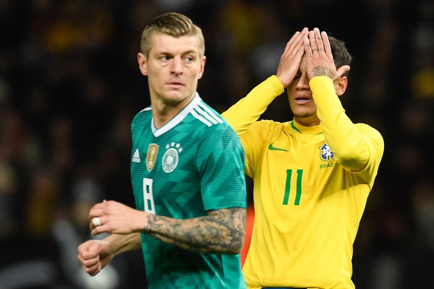 epa06633053 Germany&#039;s Toni Kroos (L) and Brazil&#039;s Philippe Coutinho (R) during the international friendly soccer match between Germany and Brazil in Berlin, Germany, 27 March 2018. EPA/FILIP ...