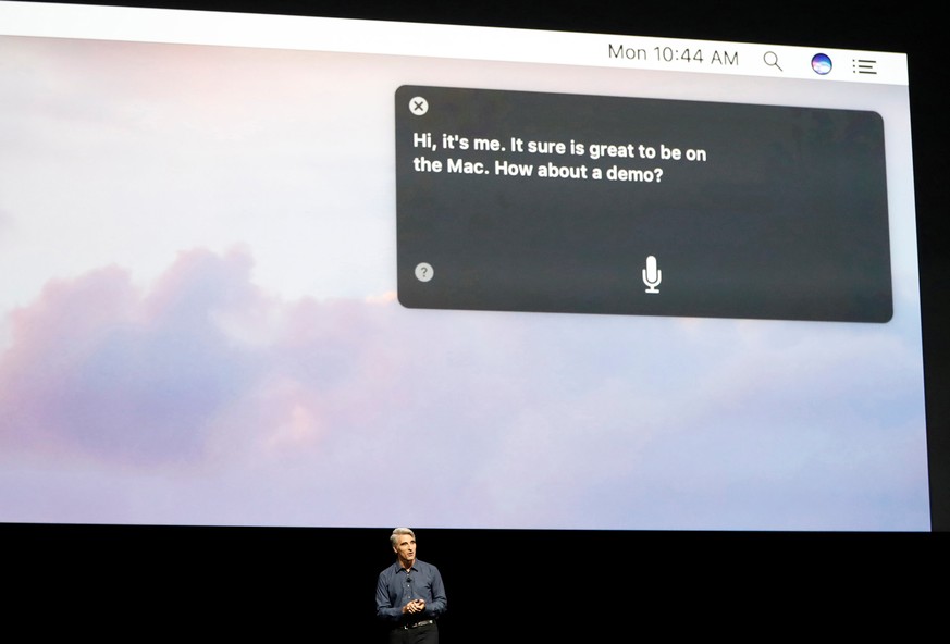 Craig Federighi, Senior Vice President of Software Engineering for Apple Inc, discusses the Siri desktop assistant for Mac OS Sierra at the company&#039;s World Wide Developers Conference in San Franc ...