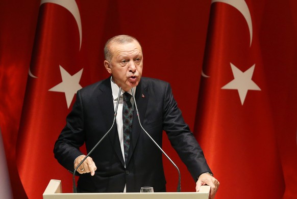 epaselect epa07909583 Turkish President Recep Tayyip Erdogan addresses provincial chairmans of ruling Justice and Development Party (AKP) in Ankara, Turkey 10 October 2019. Turkey has launched an offe ...