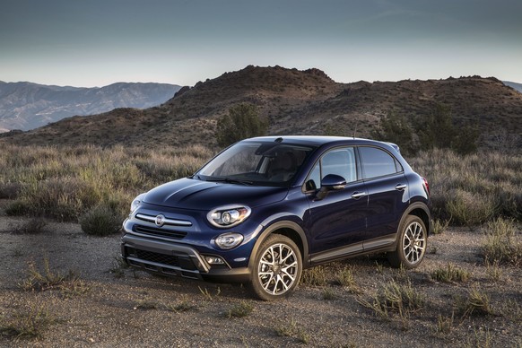 This photo provided by Fiat Chrysler Automobiles shows a 2016 Fiat 500X Trekking Plus. A distinctive choice among the vast SUV market, the 2016 Fiat 500X is a larger, taller version of Italy’s iconic  ...