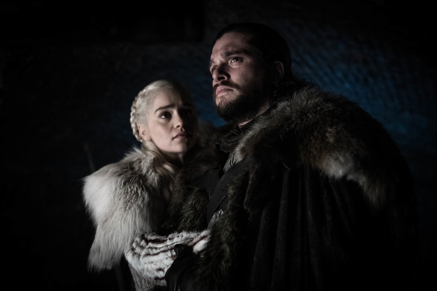 This image released by HBO shows Emilia Clarke and Kit Harington in a scene from &quot;Game of Thrones,&quot; that aired Sunday, April 21, 2019. With the Game of Thrones&#039; Jon Snow revealing his r ...