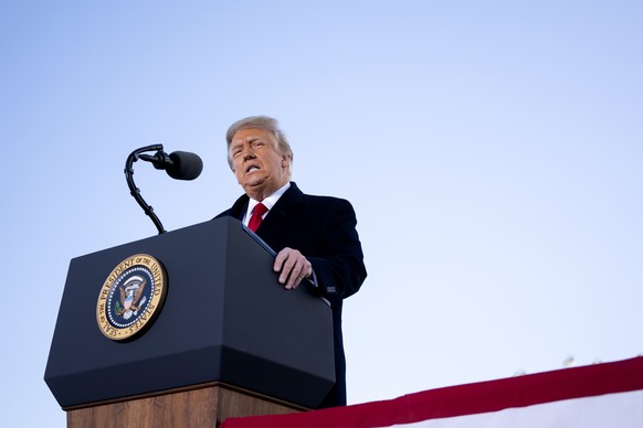 epa08951917 US President Donald Trump speaks during a farewell ceremony at Joint Base Andrews, Maryland, USA, 20 January 2021. US President Donald J. Trump is not attending the Inaugration ceremony of ...