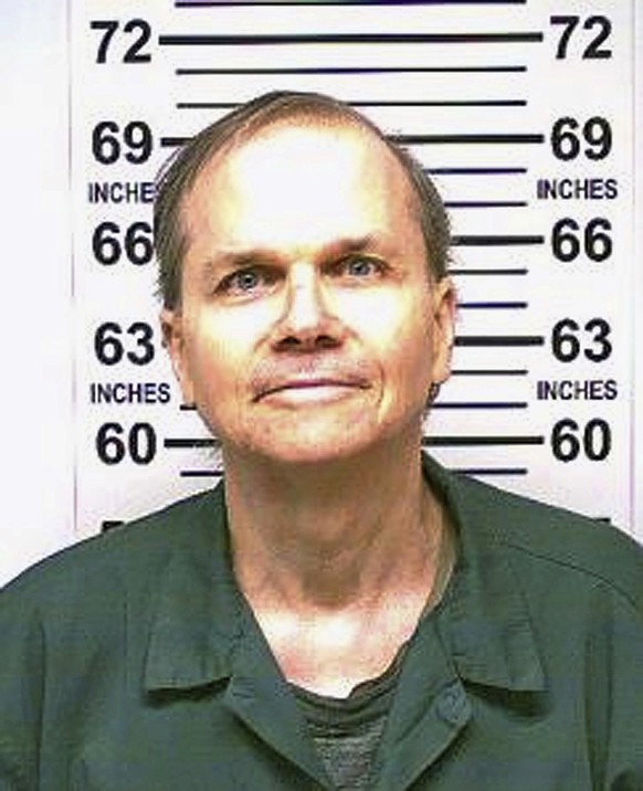 FILE - This Jan. 31, 2018 photo, provided by the New York State Department of Corrections, shows Mark David Chapman, the man who killed John Lennon outside his Manhattan apartment in 1980. Chapman sai ...