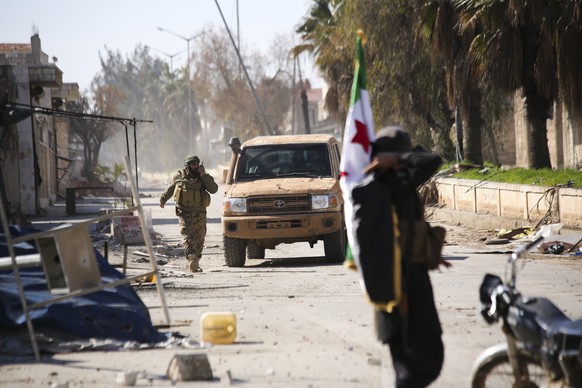 Turkish backed Syrian rebels enter the own of Saraqeb, in Idlib province, Syria, Thursday, Feb. 27, 2020. Turkey-backed Syrian opposition fighters Thursday retook a strategic northwestern town iof Sar ...