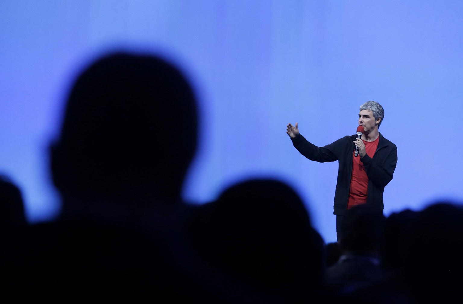 FILE- In this May 15, 2013, file photo Larry Page, Google&#039;s co-founder and chief executive, speaks during the keynote presentation at Google I/O 2013 in San Francisco. Twenty years after Page and ...
