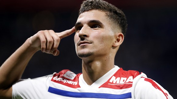 Lyon&#039;s Houssem Aouar celebrates after he scored a goal against Marseille during their French League One soccer match in Decines, near Lyon, central France, Sunday, Sept. 23, 2018. (AP Photo/Laure ...