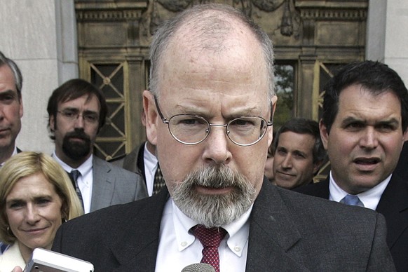 FILE - In this April 25, 2006, file photo, John Durham speaks to reporters on the steps of U.S. District Court in New Haven, Conn. Durham, ConnecticutÄôs U.S. attorney, is leading the investigation i ...