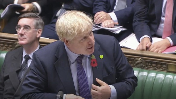 Britain&#039;s Prime Minister Boris Johnson speaks during Prime Minister&#039;s Questions in the House of Commons, London, Wednesday, Oct. 30, 2019. Johnson and opposition leader Jeremy Corbyn are gea ...