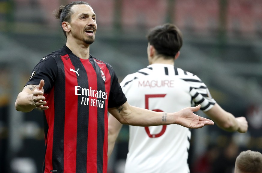 AC Milan&#039;s Zlatan Ibrahimovic gestures during the Europa League round of 16 second leg soccer match between AC Milan and Manchester United at the San Siro Stadium, in Milan, Italy, Thursday, Marc ...