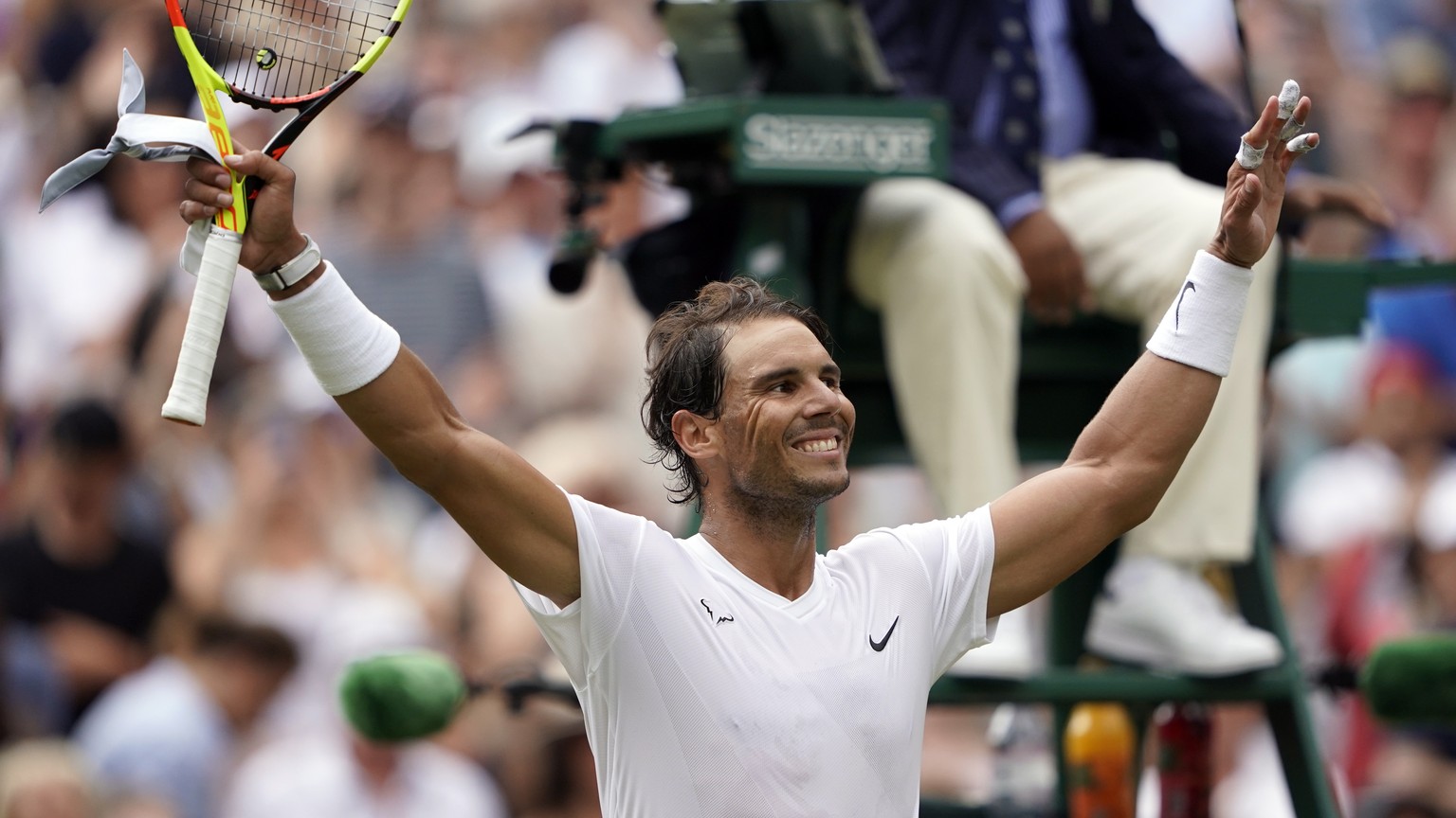 epa07703583 Rafael Nadal of Spain celebrates his win over Joao Sousa of Portugal in their fourth round match during the Wimbledon Championships at the All England Lawn Tennis Club, in London, Britain, ...