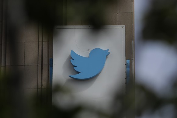 FILE - This July 9, 2019, file photo shows a sign outside of the Twitter office building in San Francisco. The Saudi government recruited two Twitter employees to get personal account information of t ...