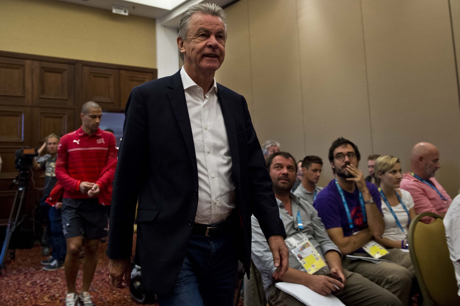 Switzerland&#039;s German coach Ottmar Hitzfeld arrives to give a press conference in Sao Paulo on July 2, 2014, the day after being defeated by Argentina during the 2014 FIFA World Cup round of 16 fo ...