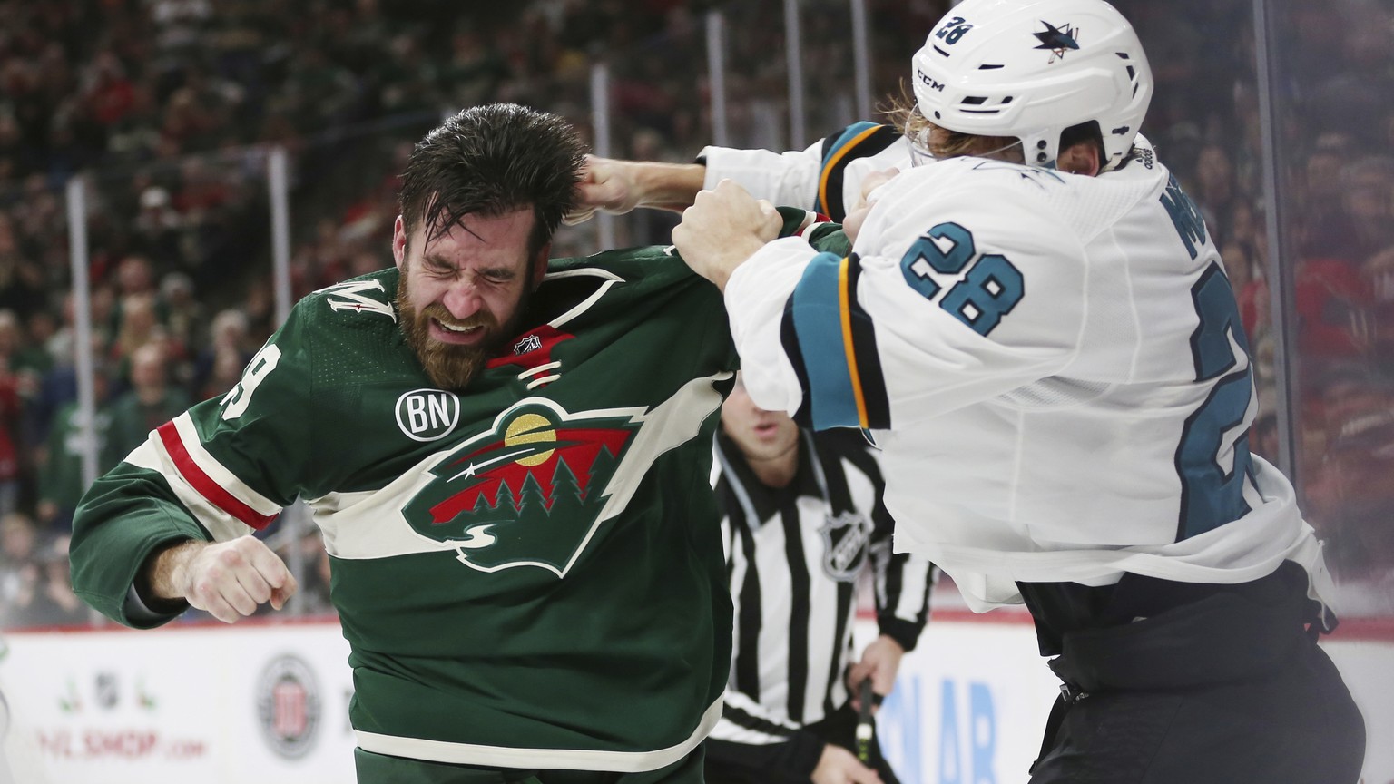 San Jose Sharks&#039; Timo Meier of Switzerland fights Minnesota Wild&#039;s Greg Pateryn in the second period of an NHL hockey game Tuesday, Dec. 18, 2018, in St. Paul, Minn. (AP Photo/Stacy Bengs)