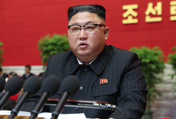 epa08921297 A photo released by the official North Korean Central News Agency (KCNA) shows Kim Jong-un, Leader of the Democratic People&#039;s Republic of Korea, speaking during the 8th Congress of th ...