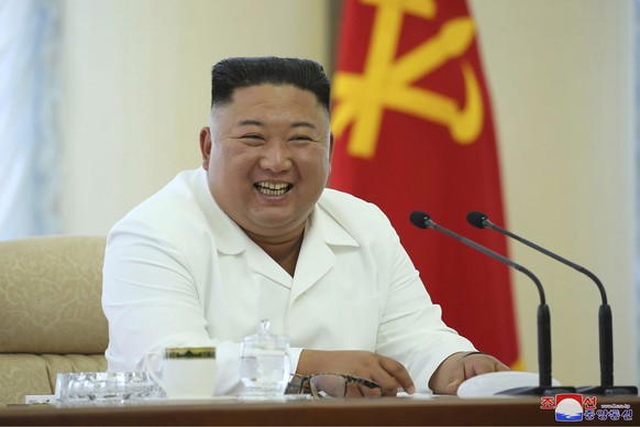 In this photo provided by the North Korean government, North Korean leader Kim Jong Un attends a meeting of the Politburo of the Central Committee of the Workers&#039; Party of Korea in North Korea Su ...