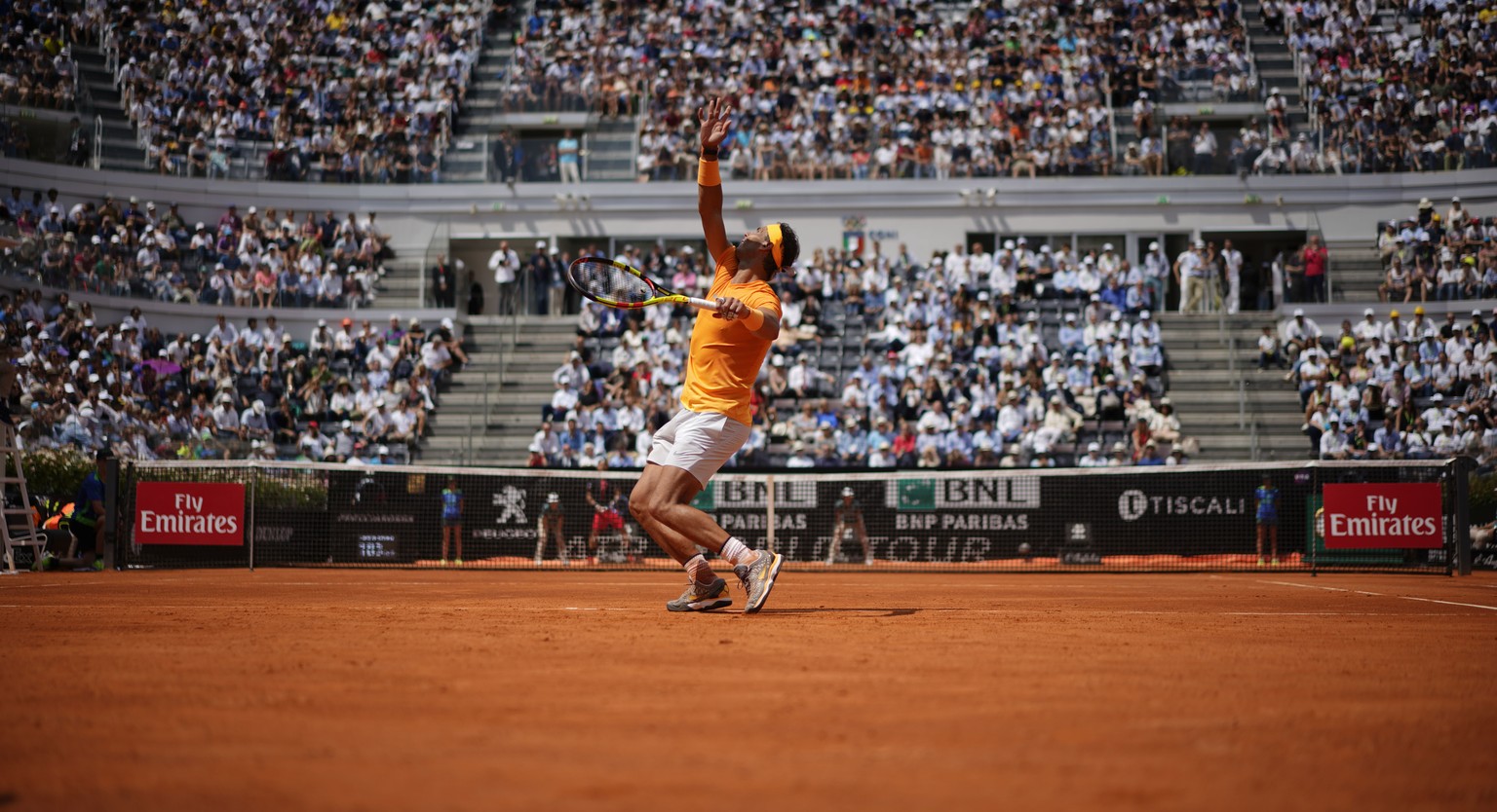 Spain&#039;s Rafael Nadal serves the ball to Italy&#039;s Fabio Fognini during a quarter final match at the Italian Open tennis tournament in Rome, Friday, May 18, 2018. Nadal won 4-6, 6-1, 6-2. (AP P ...