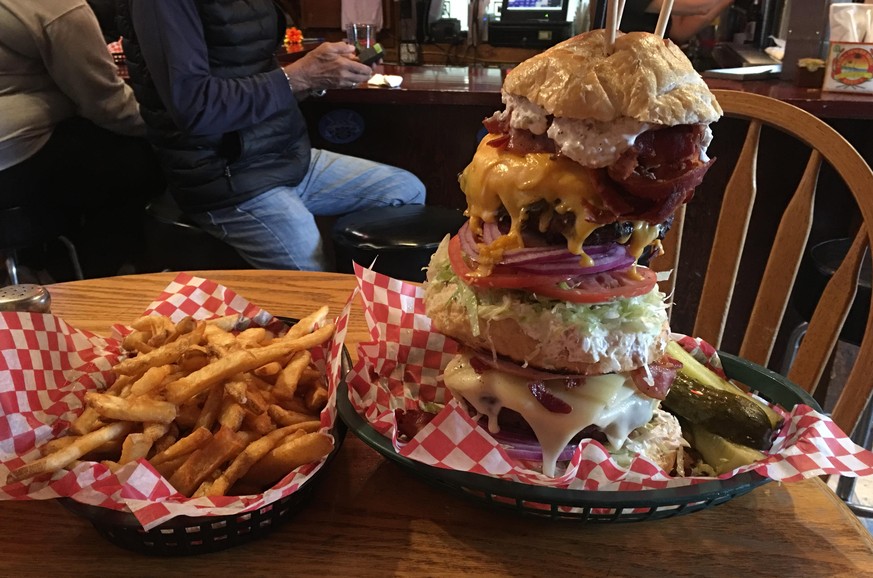 Seward&#039;s Folly Burger at the West Rib Pub in Talkeetna, AK
This bad boy touts itself as being the biggest burger in Alaska and considering it weighs in around 5 pounds, we can&#039;t disagree. To ...