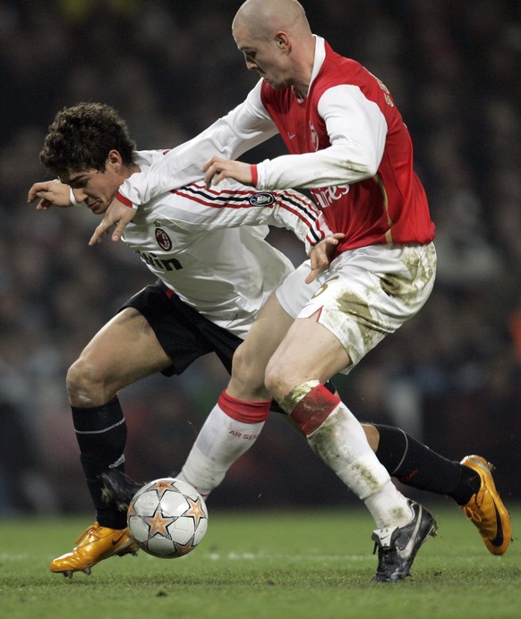 Arsenal&#039;s Philippe Senderos, right, vies for the ball with AC Milan&#039;s Pato, left, during their Champions League round of 16 soccer match at the Emirates Stadium in London, Wednesday, Feb. 20 ...