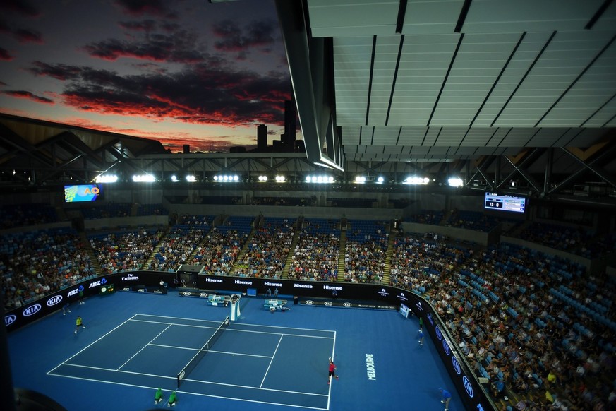 epa05721251 General view of a sunset over Margaret Court Arena during play between Stan Wawrinka of Switzerland and Martin Klizan of Slovakia during ther Men&#039;s Singles first round at the Australi ...
