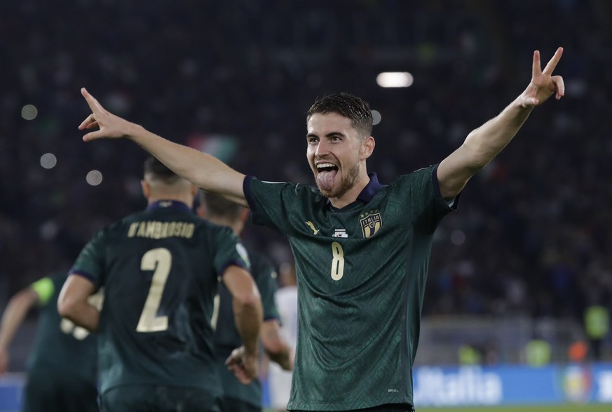 Italy&#039;s Jorginho celebrates after he scores the opening goal of the game from the penalty spot during the Euro 2020 group J qualifying soccer match between Italy and Greece in Rome, Italy, Saturd ...