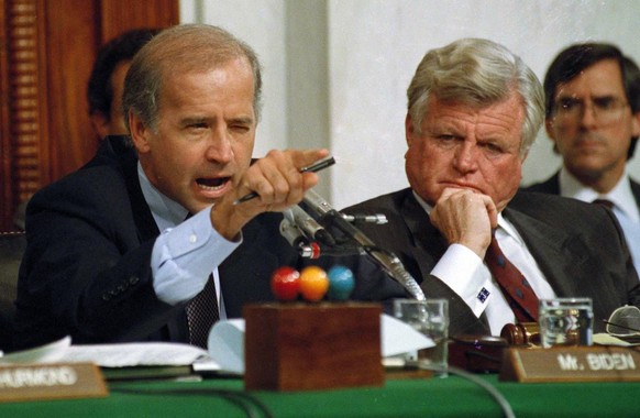 FILE - In this Oct. 12, 1991, file photo, then-Senate Judiciary Committee Chairman Sen. Joe Biden, D-Del., points angrily at Clarence Thomas during comments at the end of hearings on Thomas&#039; nomi ...