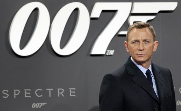 FILE - This is a Wednesday, Oct. 28, 2015 file photo of actor Daniel Craig poses for the media as he arrives for the German premiere of the James Bond movie &quot;Spectre&quot; in Berlin, Germany. The ...