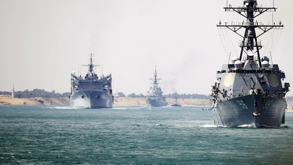 In this photo provided by the U.S. Navy, the Abraham Lincoln Carrier Strike Group transits the Suez Canal, Thursday, May 9, 2019. The Abraham Lincoln Carrier Strike Group is deployed to the U.S. Centr ...