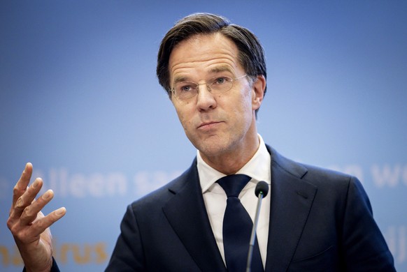 epa09092298 Outgoing Prime Minister Mark Rutte speaks during a press conference on the coronavirus measures, in The Hague, Netherlands, 23 March 2021. The Dutch government said the current lockdown in ...