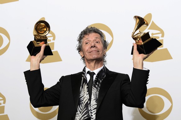 epa09005313 (FILE) - US jazz musician Chick Corea holds the awards for &#039;Best Improvised Jazz Solo&#039; and &#039;Best Jazz Instrumental Album&#039; at the 57th annual Grammy Awards held at the S ...