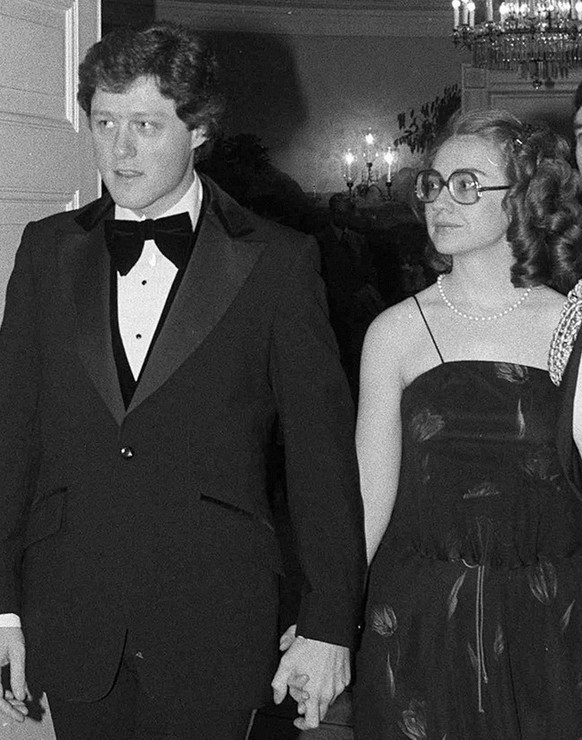 FILE - In this Feb. 27, 1979 file photo, Arkansas Gov. Bill Clinton and his wife, Hillary, enter the White House in Washington to attend a dinner honoring the nation&#039;s governors. (AP Photo/Barry  ...