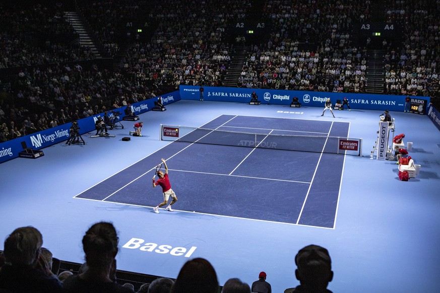 epa07951816 Roger Federer (L) of Switzerland in action during his semifinal match against Stefanos Tsitsipas of Greece at the Swiss Indoors tennis tournament in Basel, Switzerland, 26 October 2019. EP ...