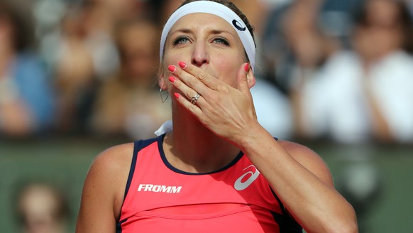 epa06010302 Timea Bacsinszky of Switzerland reacts after winning against Venus Williams of the USA during their women’s singles 4th round match during the French Open tennis tournament at Roland Garro ...