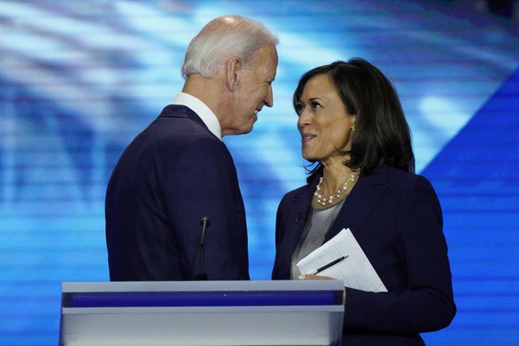 FILE - In this Sept. 12, 2019, file photo, Democratic presidential candidate former Vice President Joe Biden, left, and then-candidate Sen. Kamala Harris, D-Calif. shake hands after a Democratic presi ...