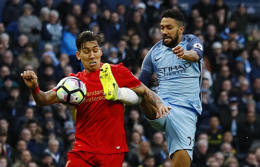 Britain Soccer Football - Manchester City v Liverpool - Premier League - Etihad Stadium - 19/3/17 Manchester City&#039;s Gael Clichy fouls Liverpool&#039;s Roberto Firmino for a penalty Action Images  ...